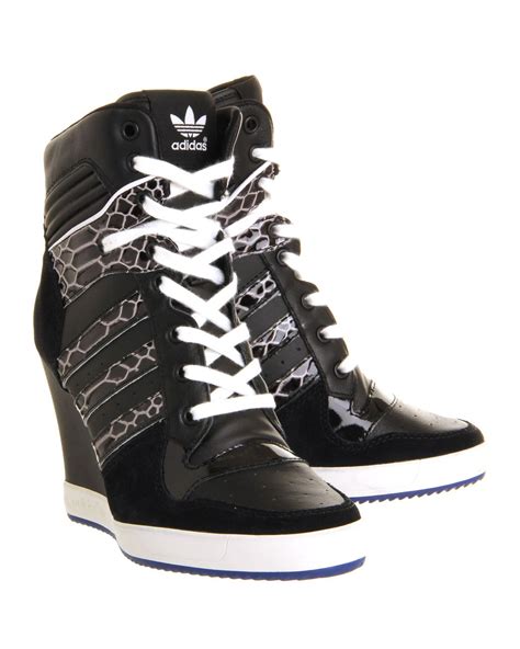 adidas high top wedge sneakers.